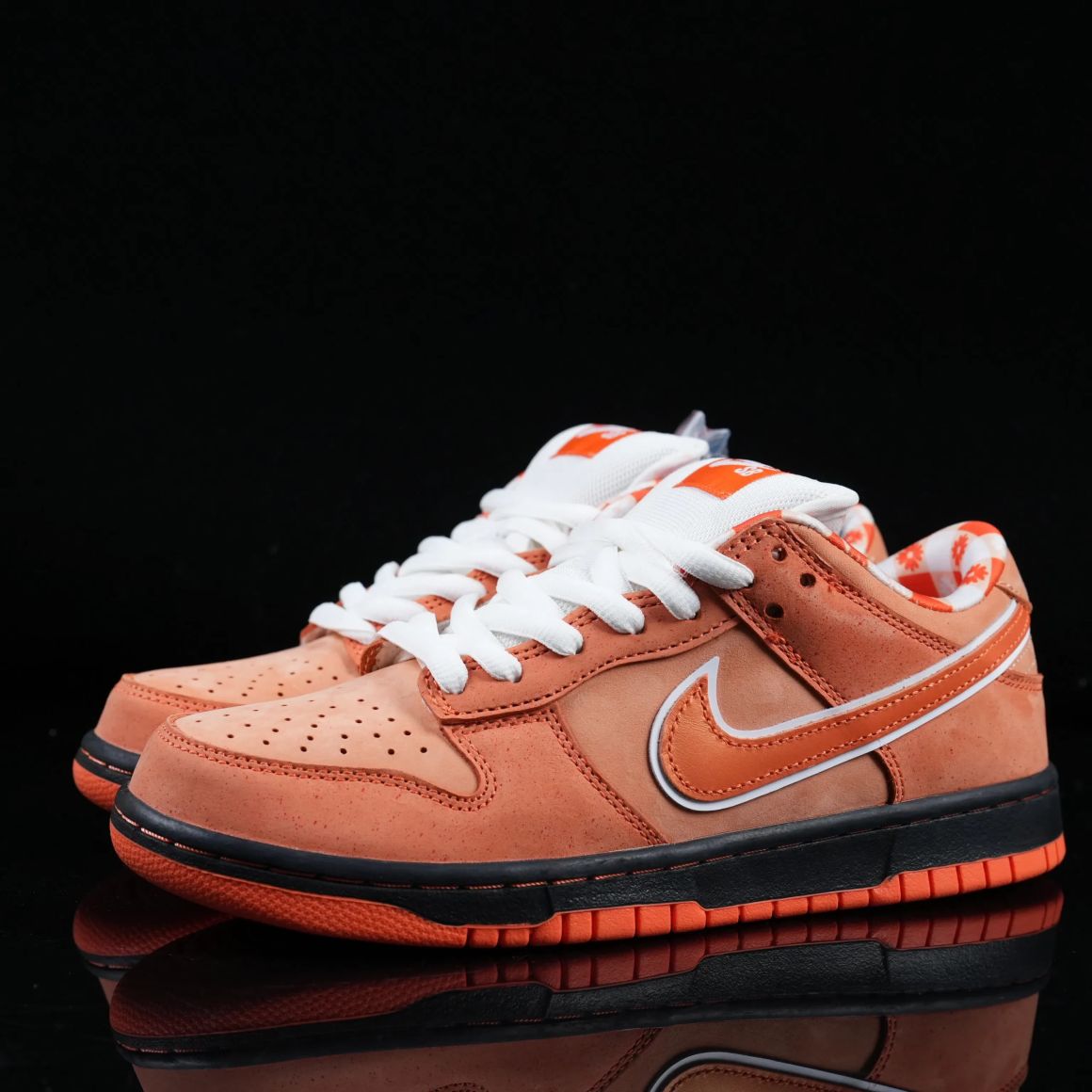 x CONCEPTS Dunk SB Orange Lobster FD8776-800