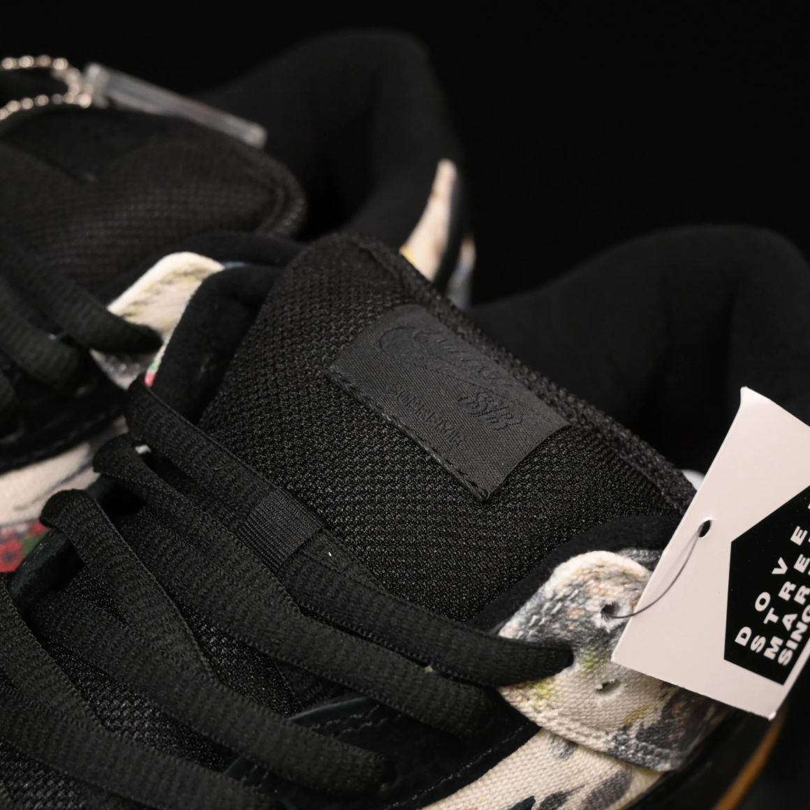 Supreme x Dunk Low SB 'Rammellzee' FD8778-001